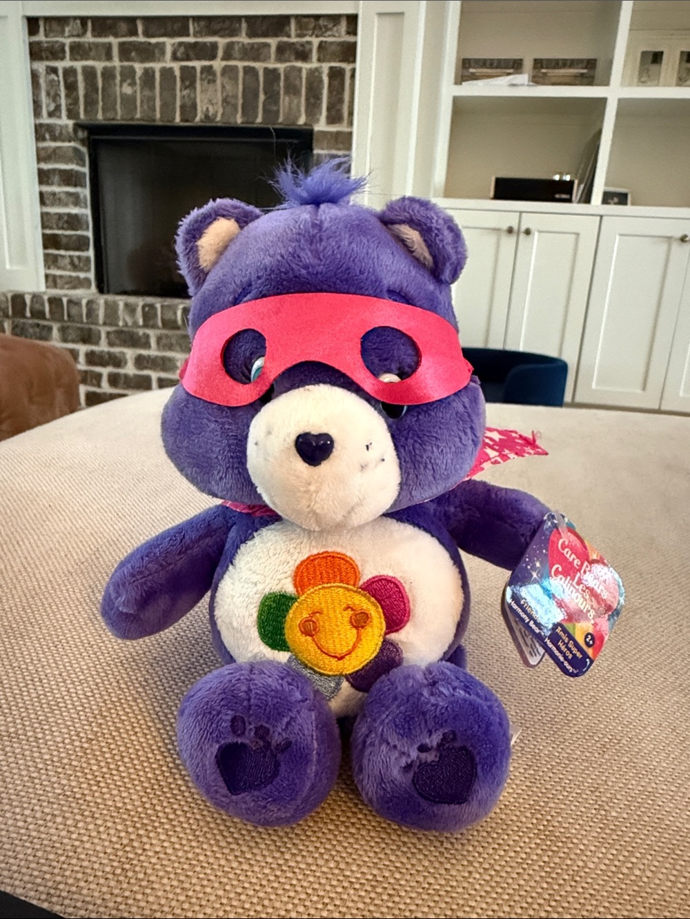 Care Bears Purple Plush with Pink Mask and Rainbow Flower Belly Badge